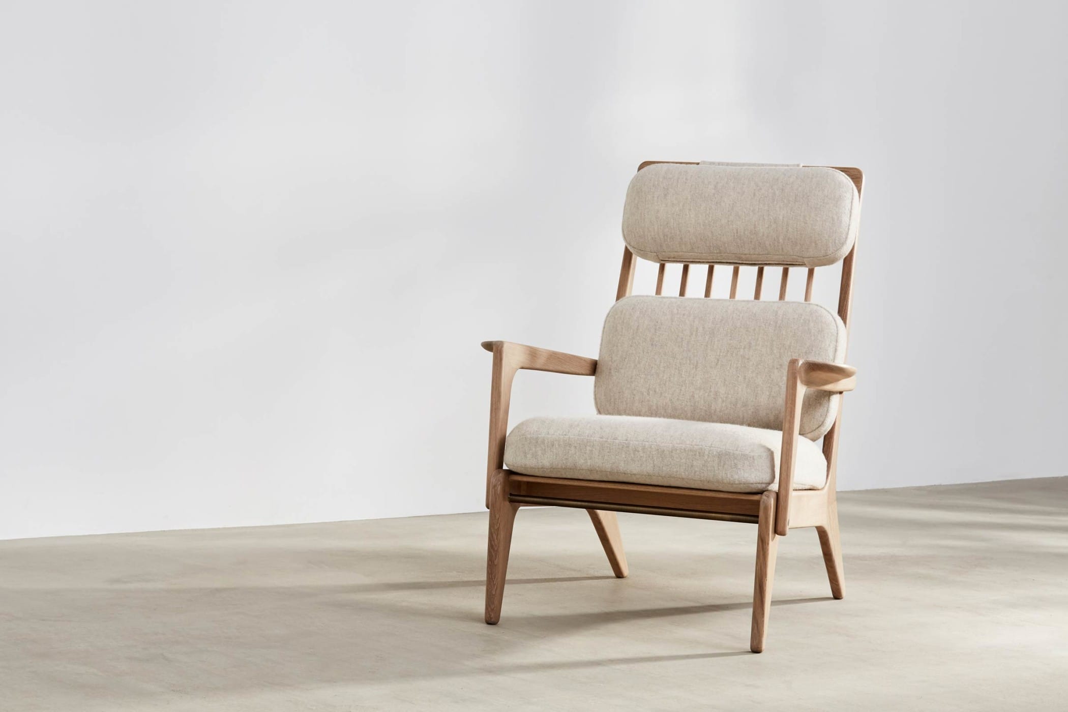 oak high-backed chair with white wool upholstery