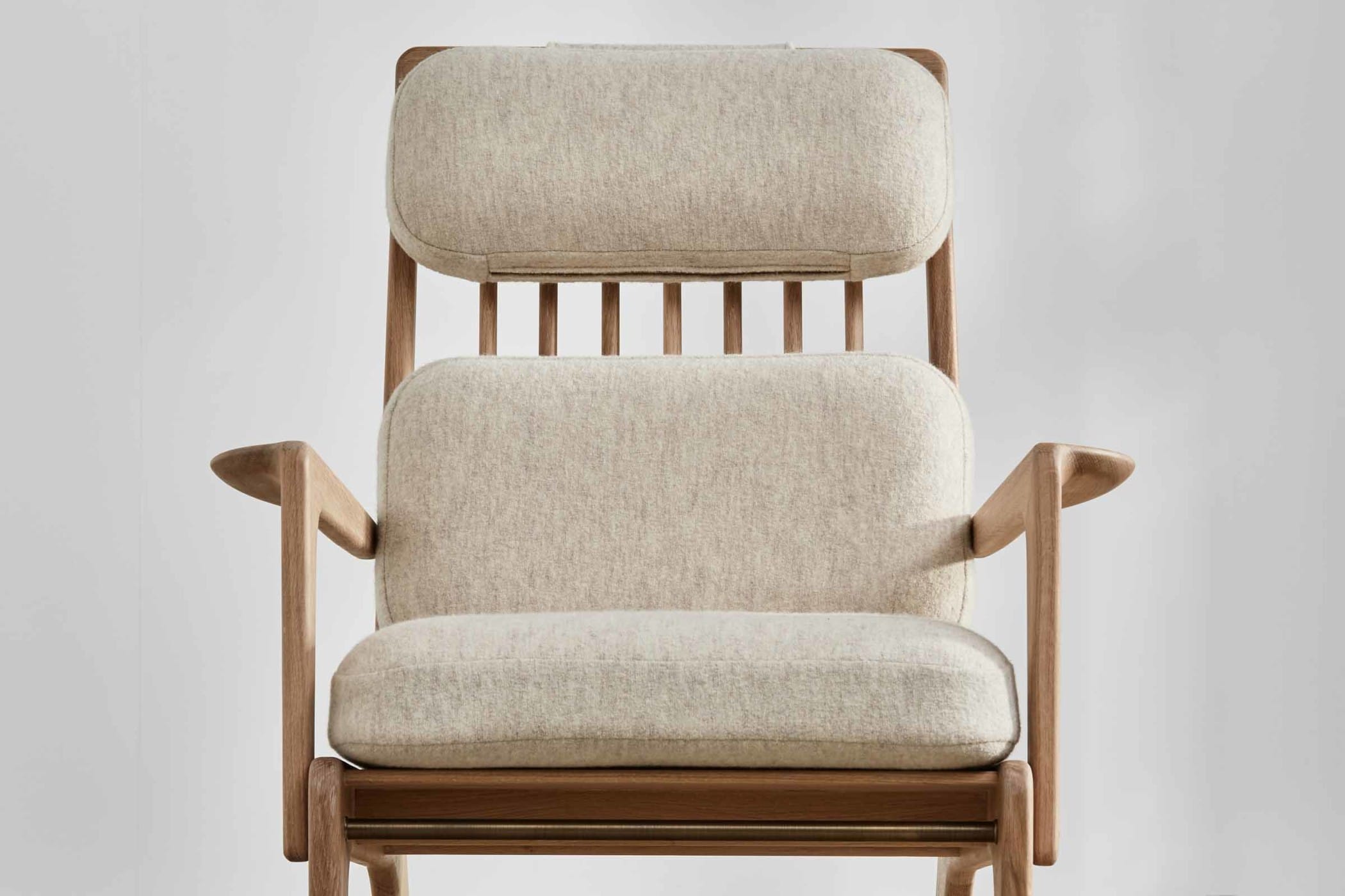 oak high-backed chair with white wool upholstery