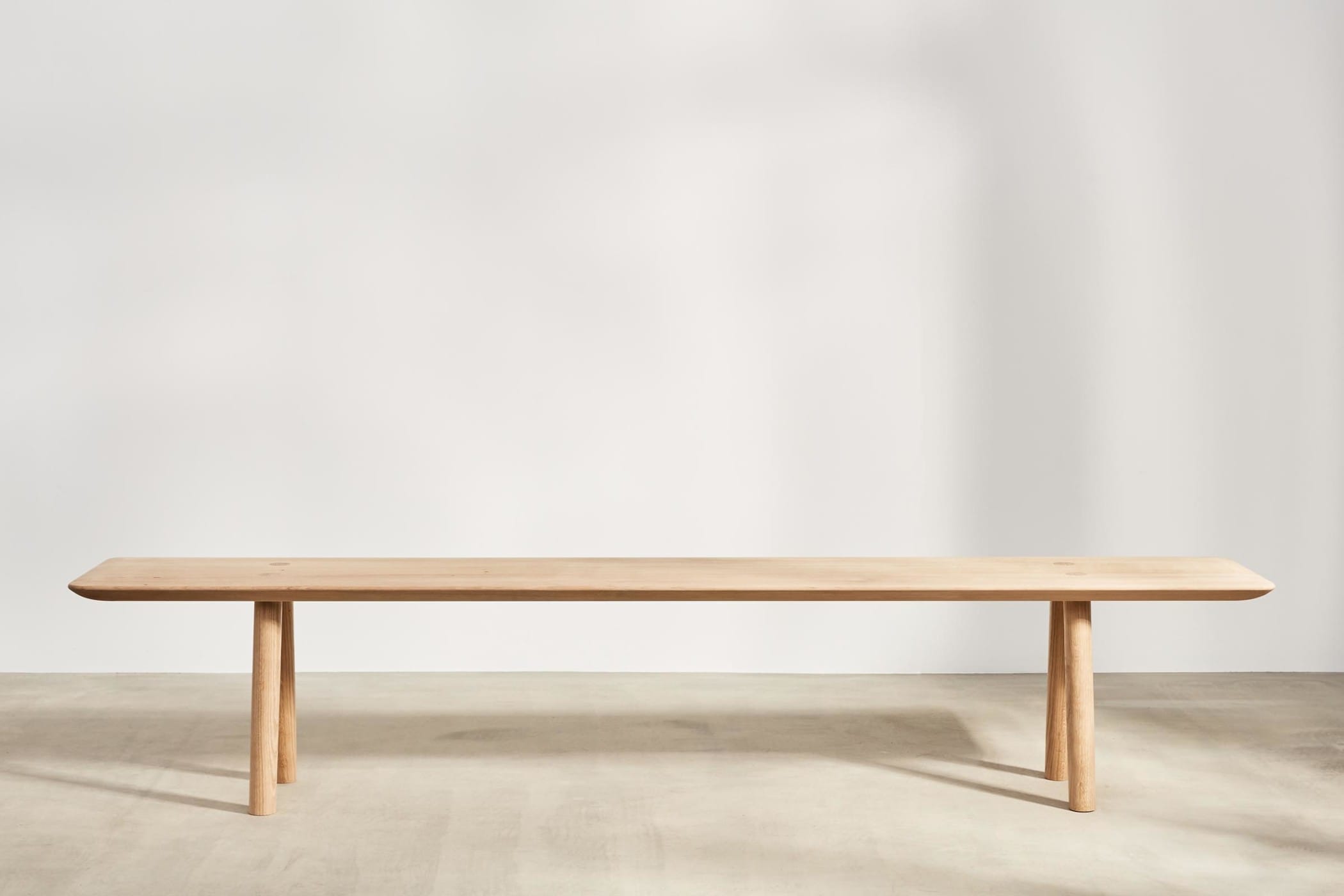 modern looking long bench made from oak