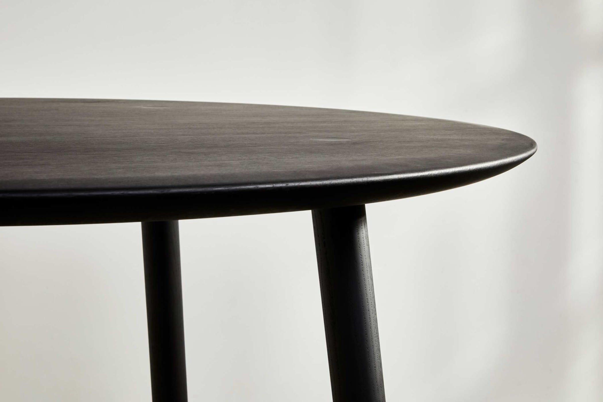 black ebonised table