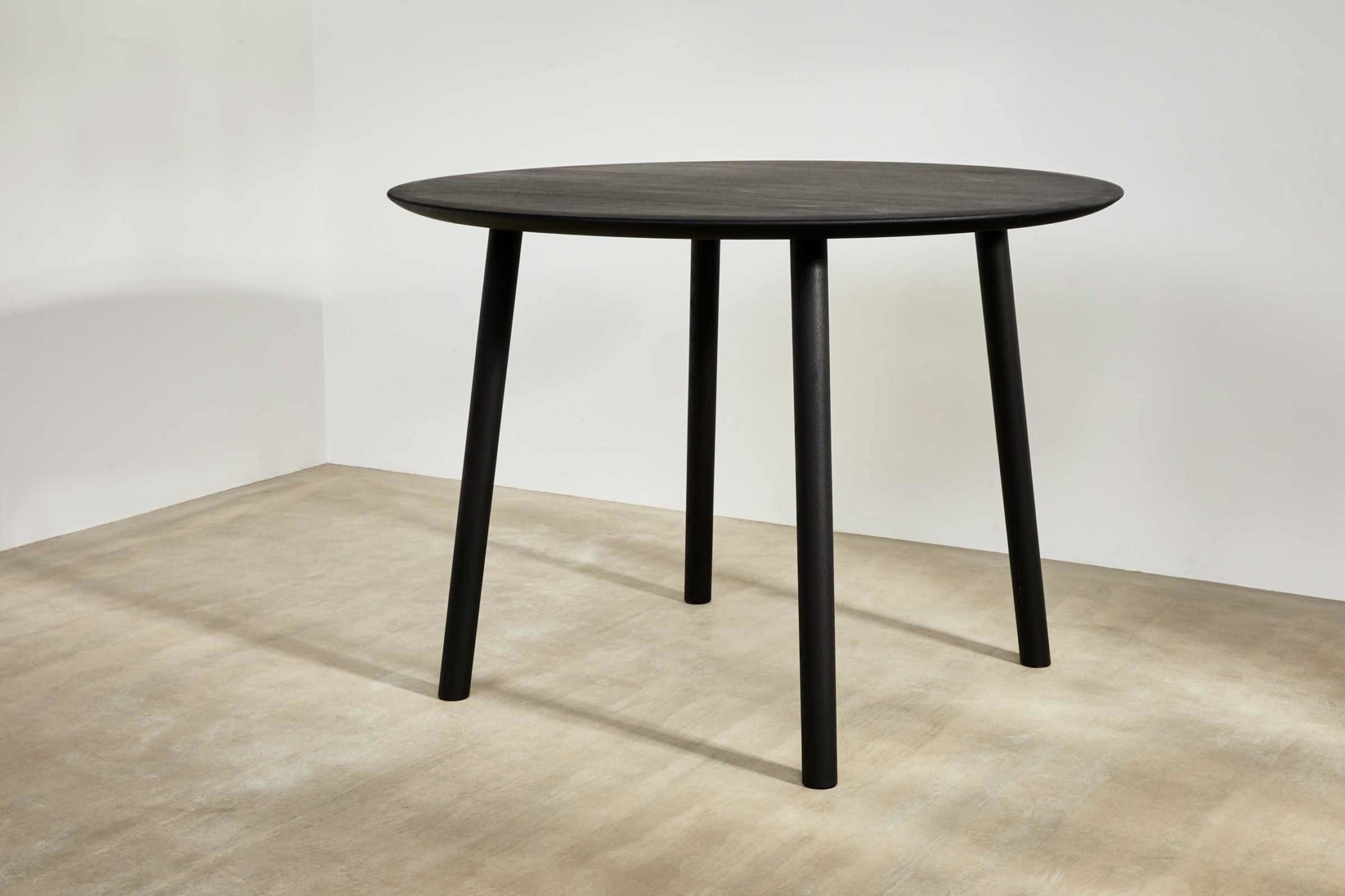 black ebonised table