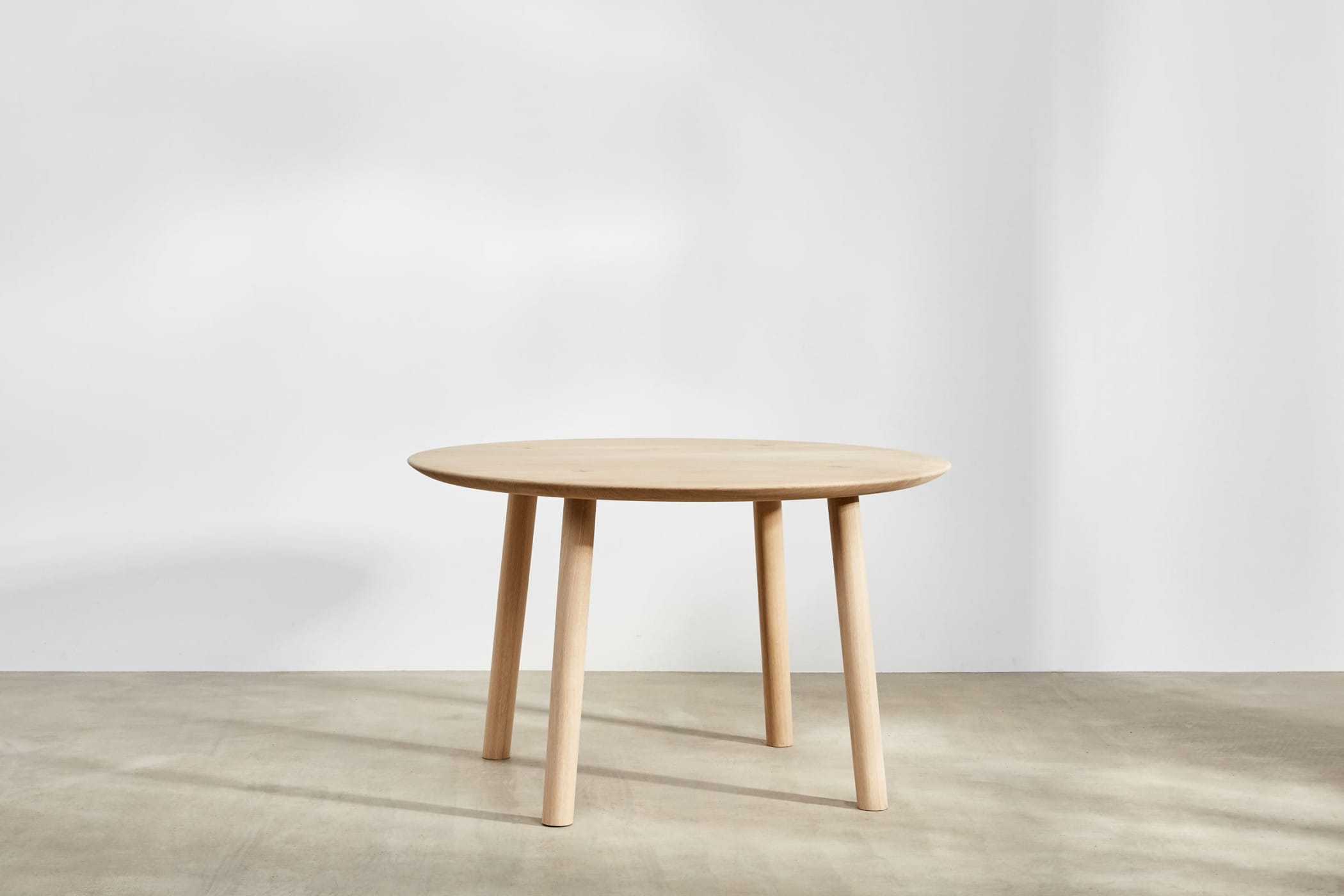 round dining table made from oak