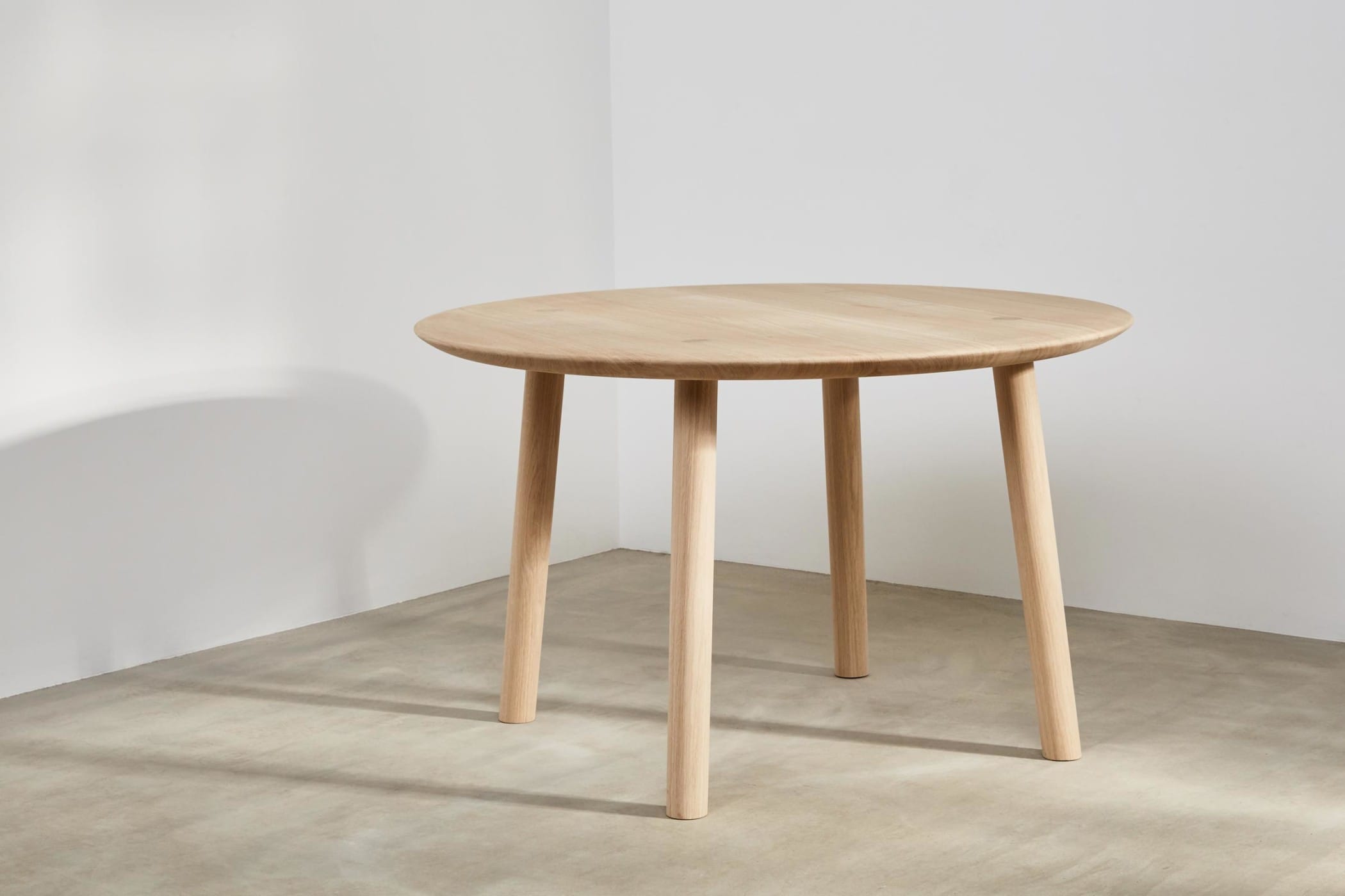 round dining table made from oak