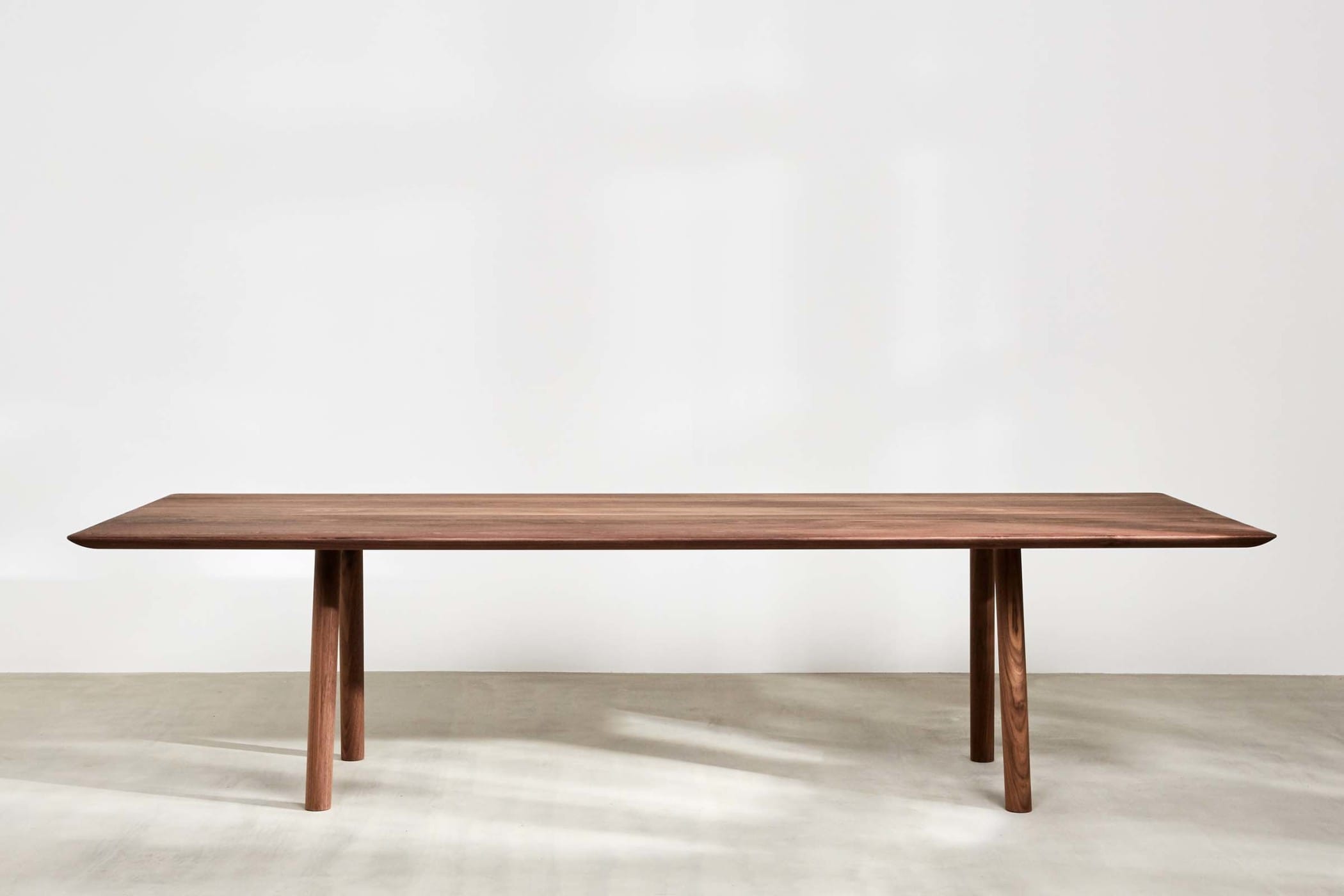 modern dining table made from walnut