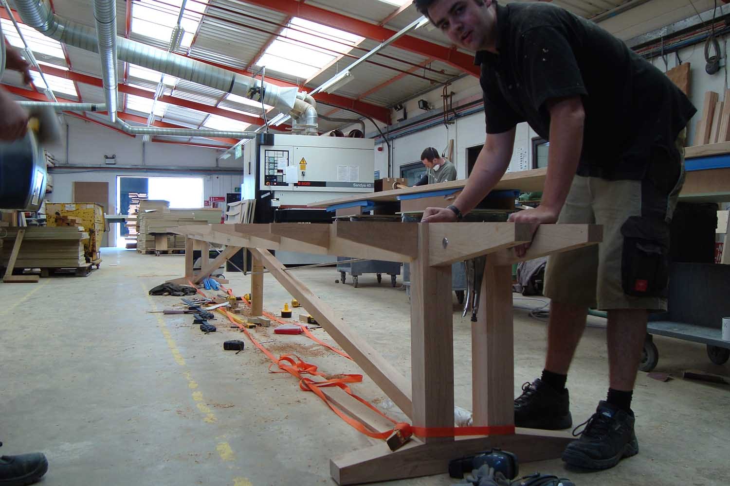 bespoke 32 seat dining table for Queens College Oxford
