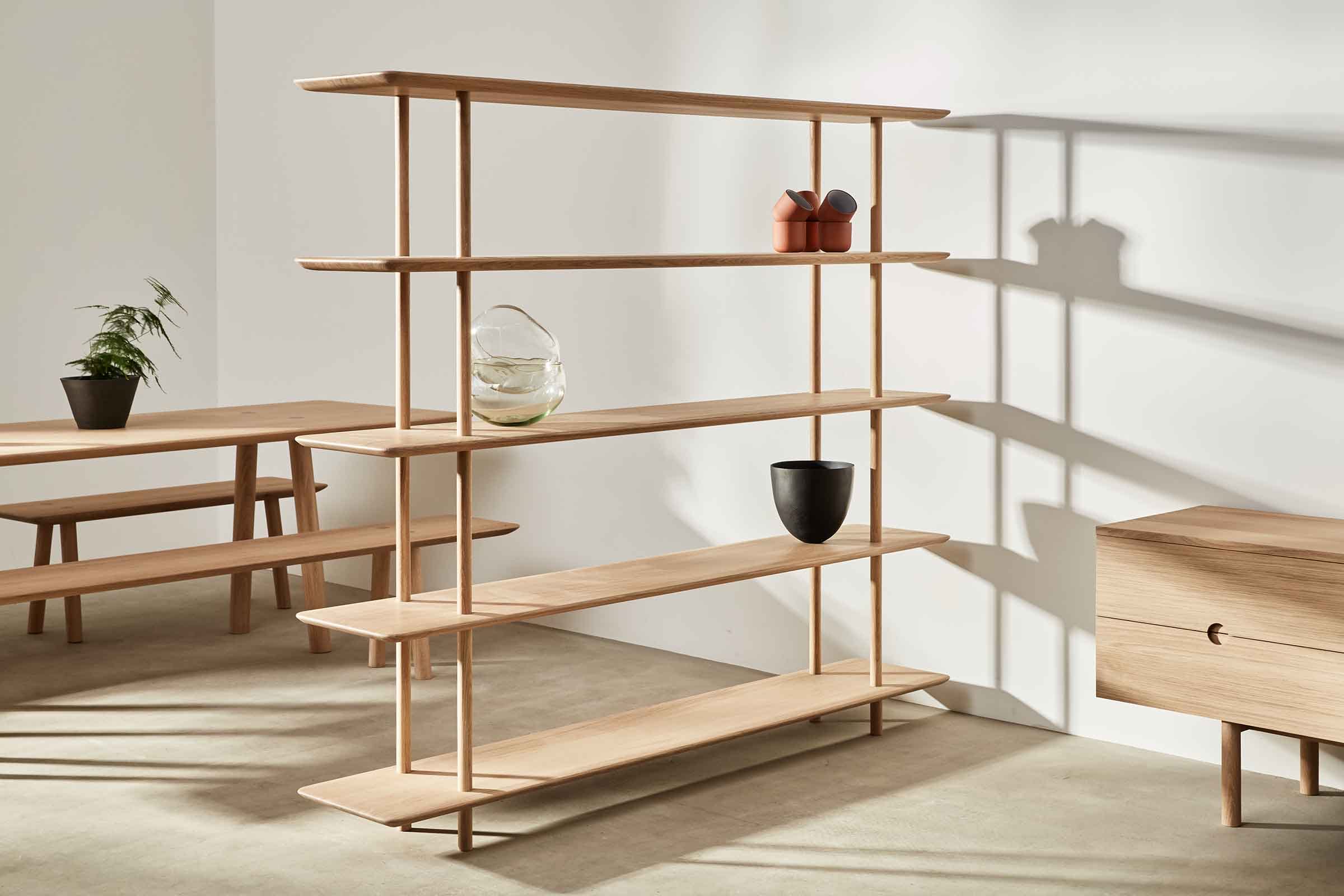 styled oak shelving with dining table and sideboard