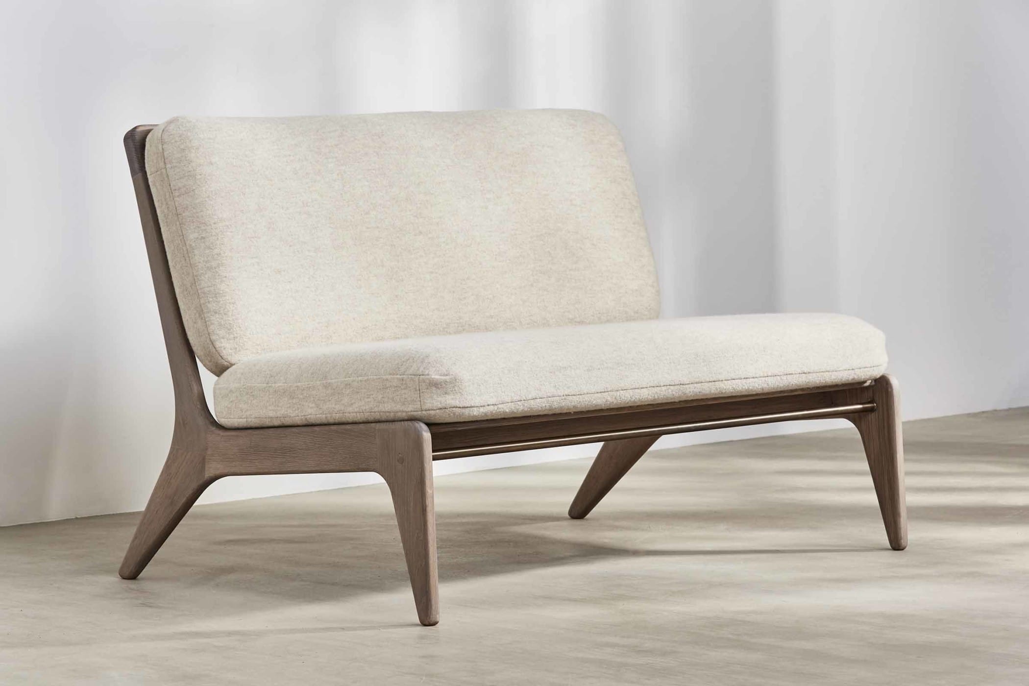 Small spindle backed sofa