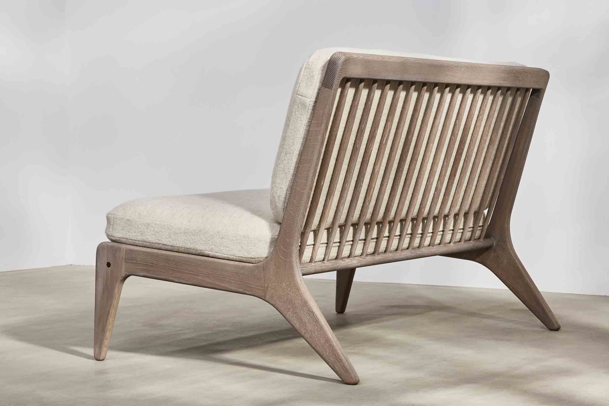 Small spindle backed sofa