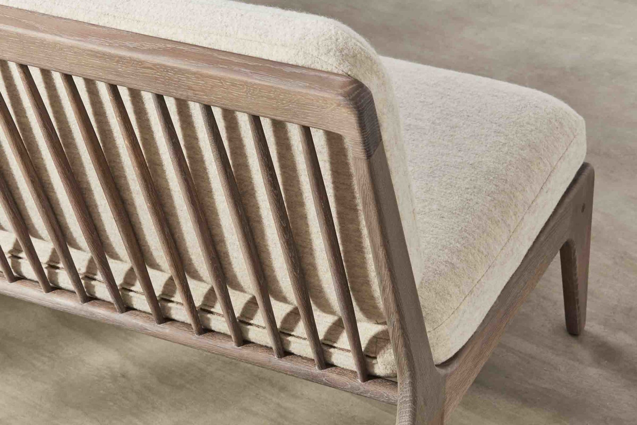 Small spindle backed sofa