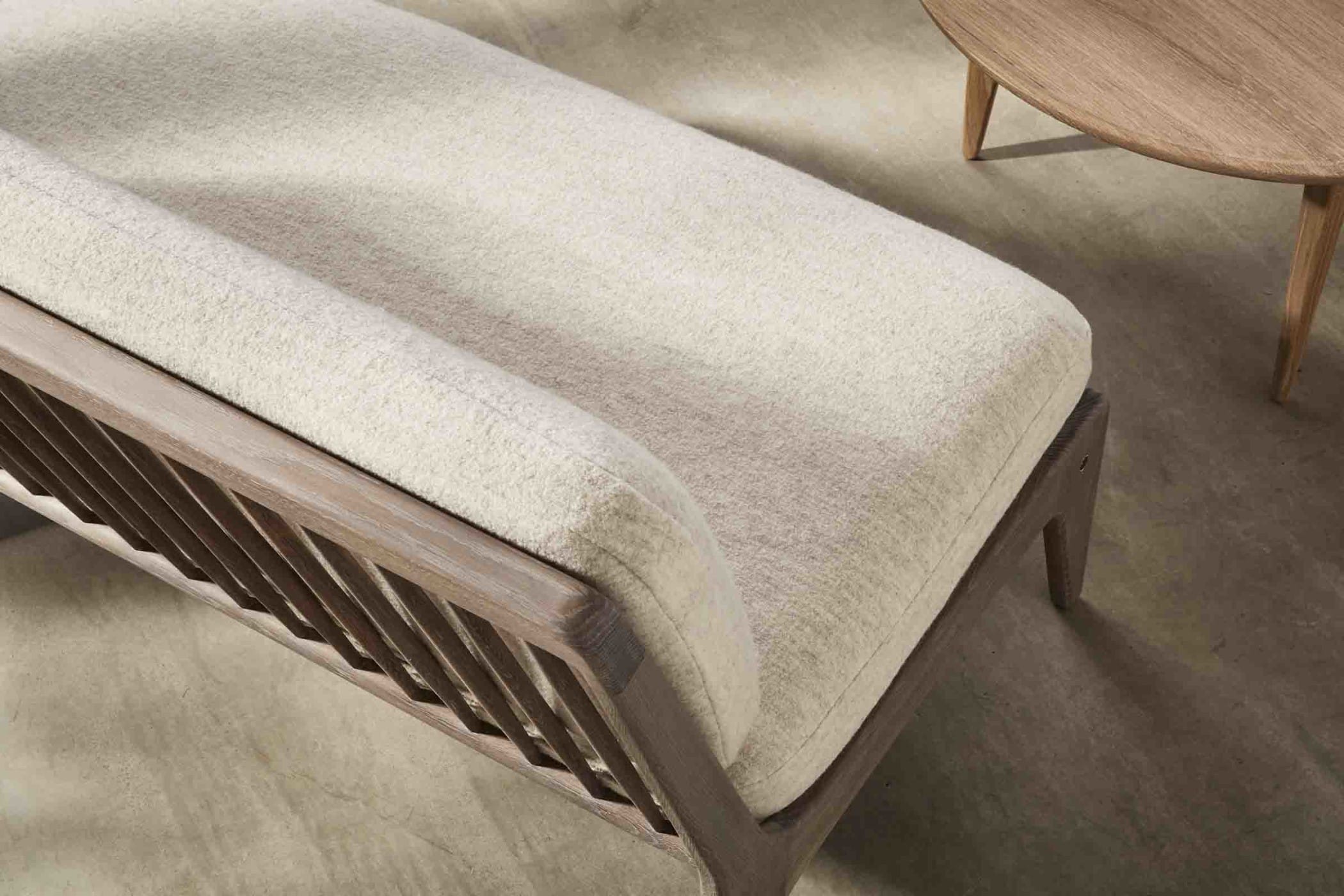 Small spindle backed sofa designed by Space Copenhagen