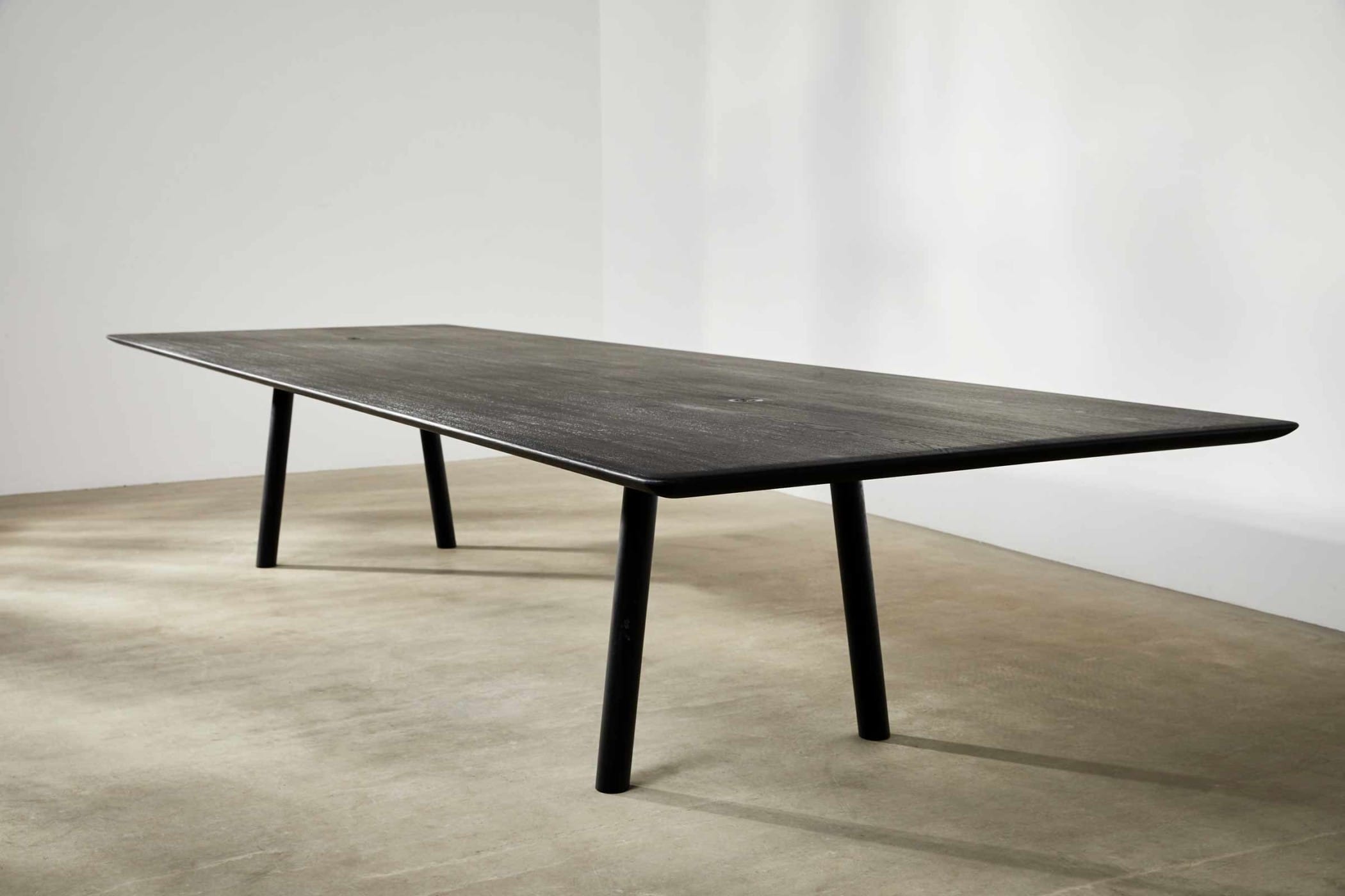 large ebonised oak meeting table