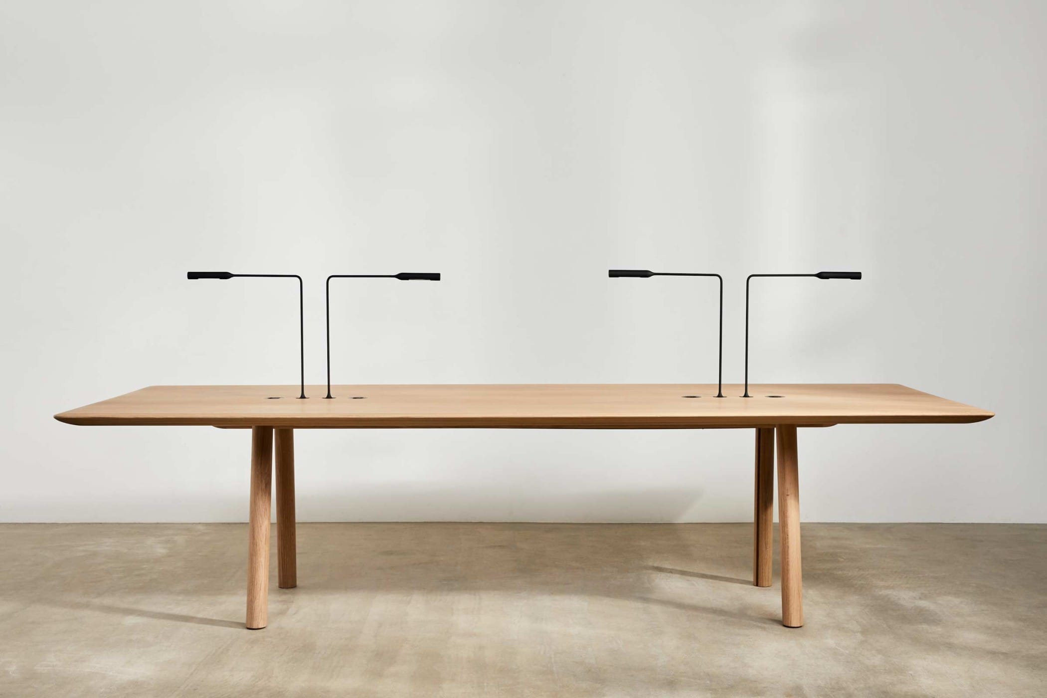 large oak meeting table with built in lights