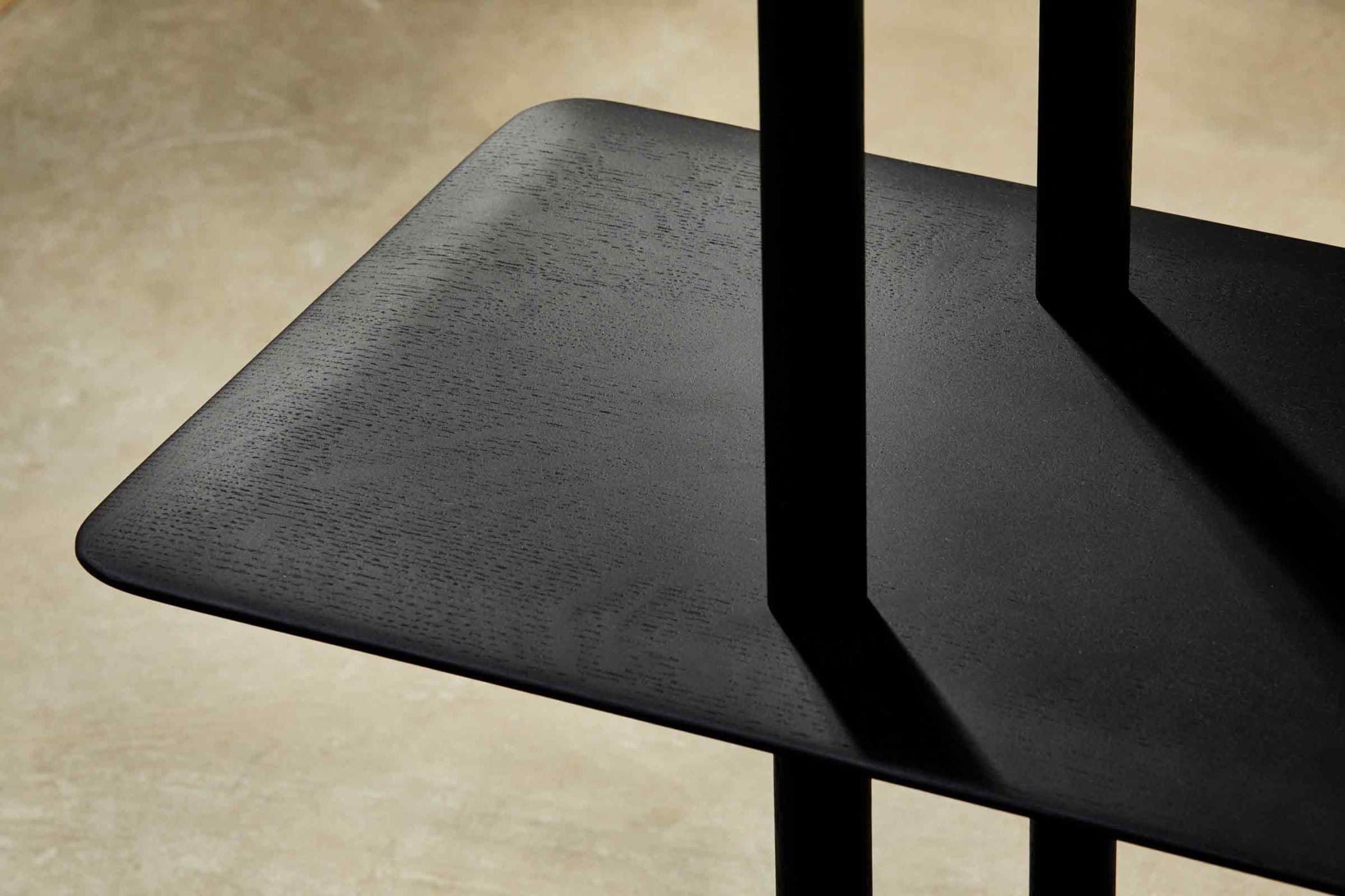 close-up of ebonised oak shelf