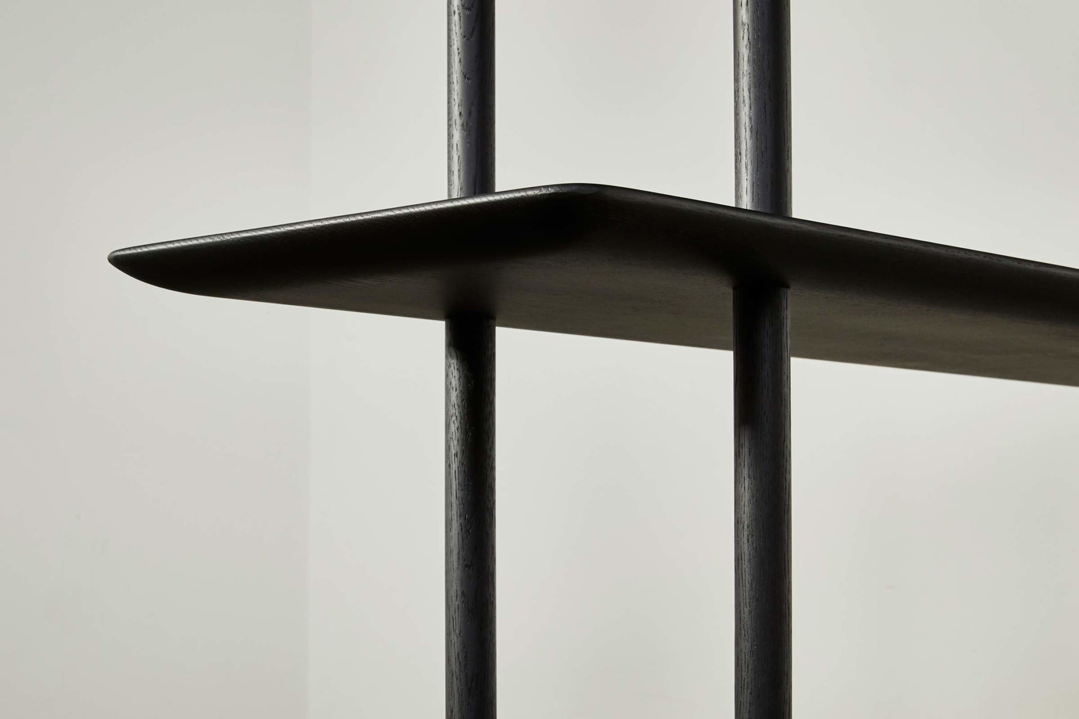 close-up of ebonised oak shelf