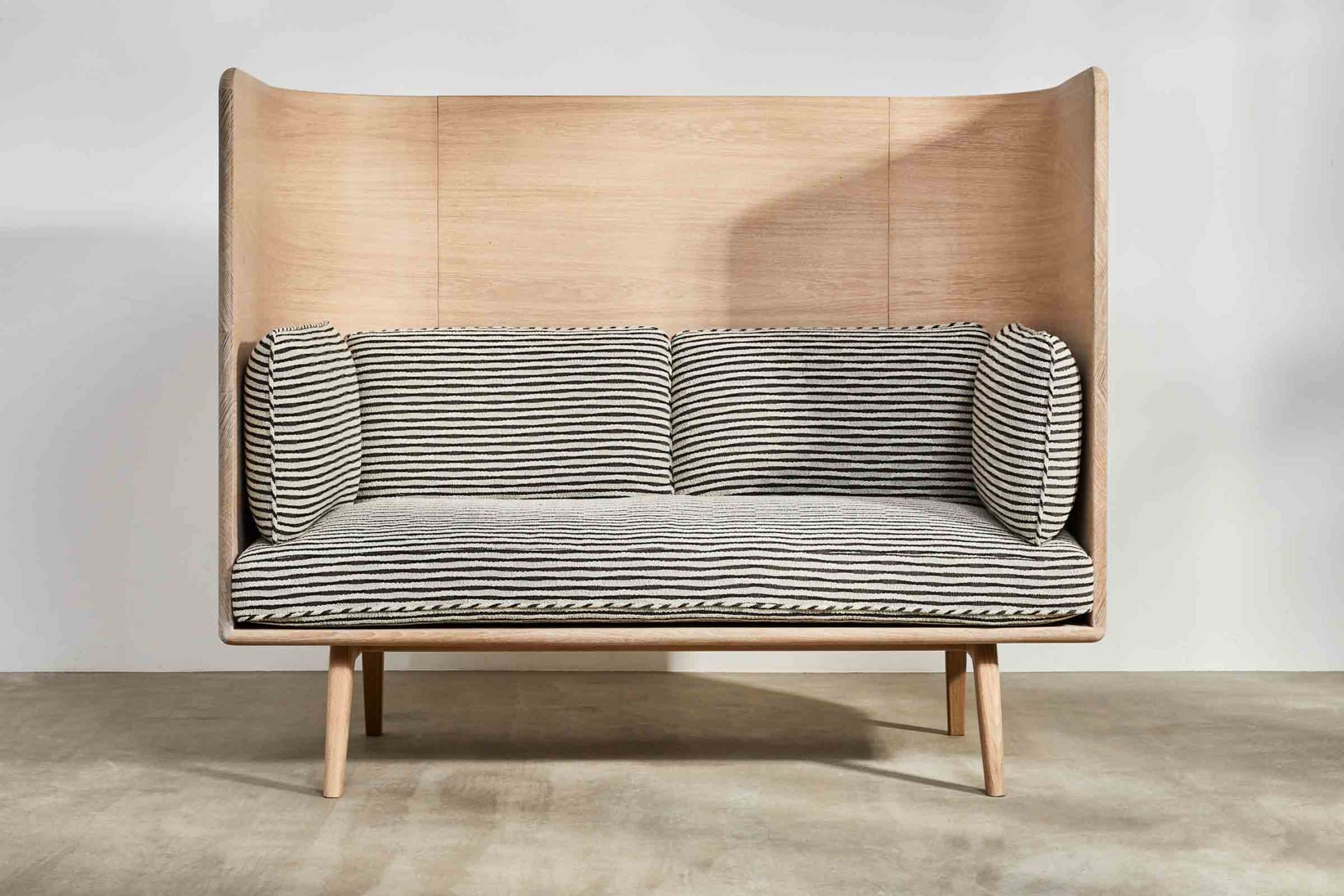oak high sofa with striped cushions