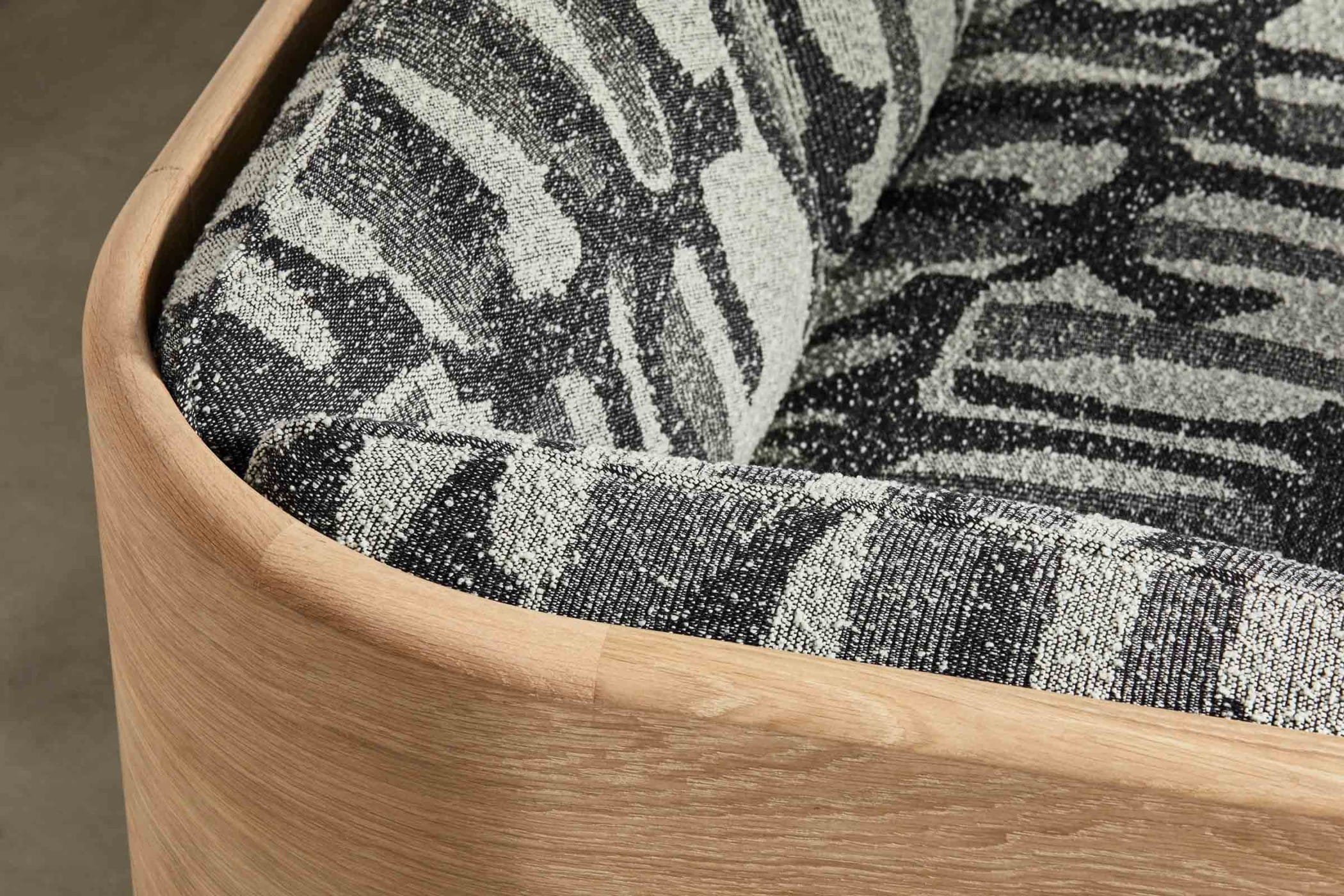 oak sofa with black and white fabic