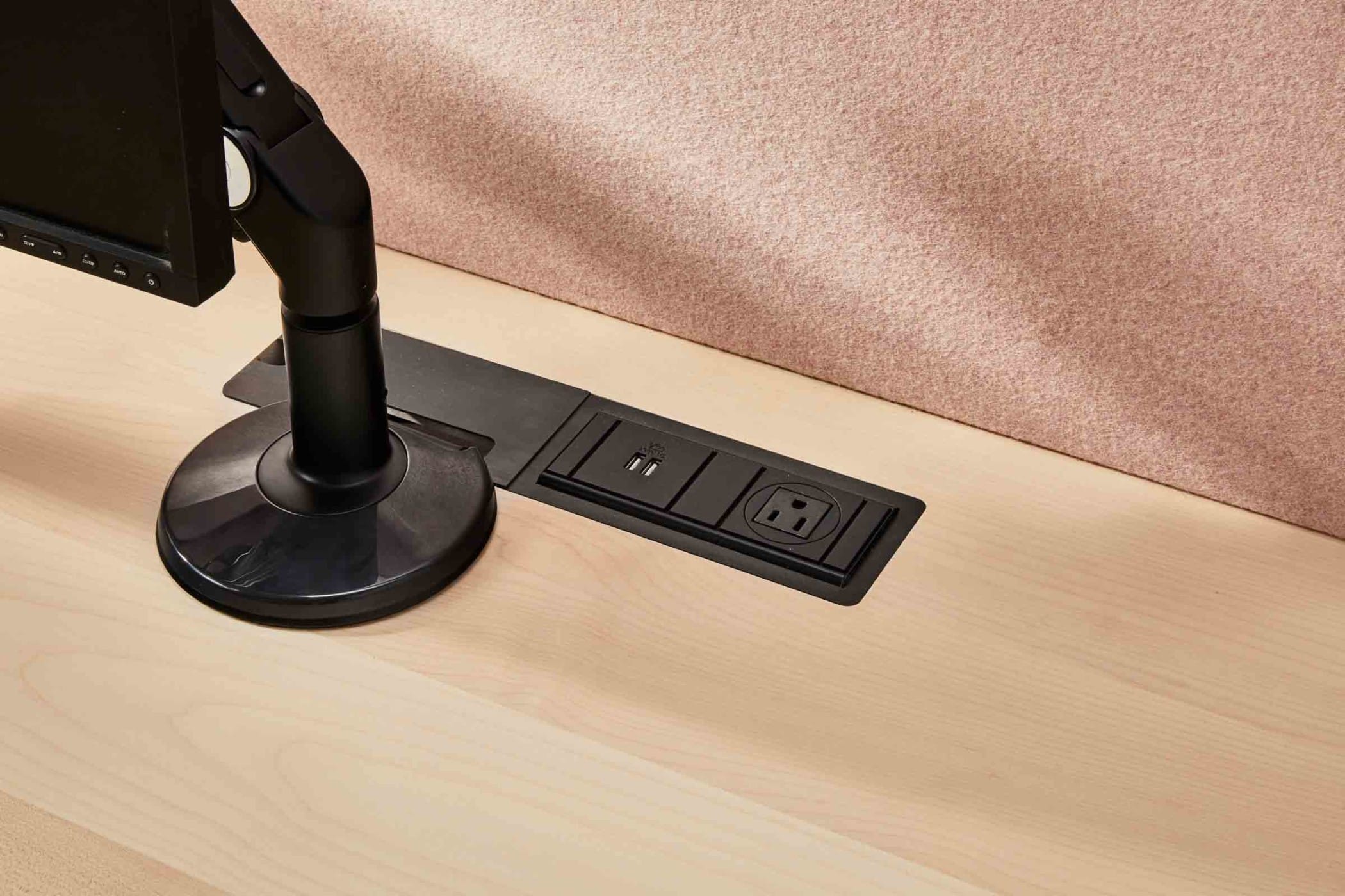 close up of power sockets on a desk