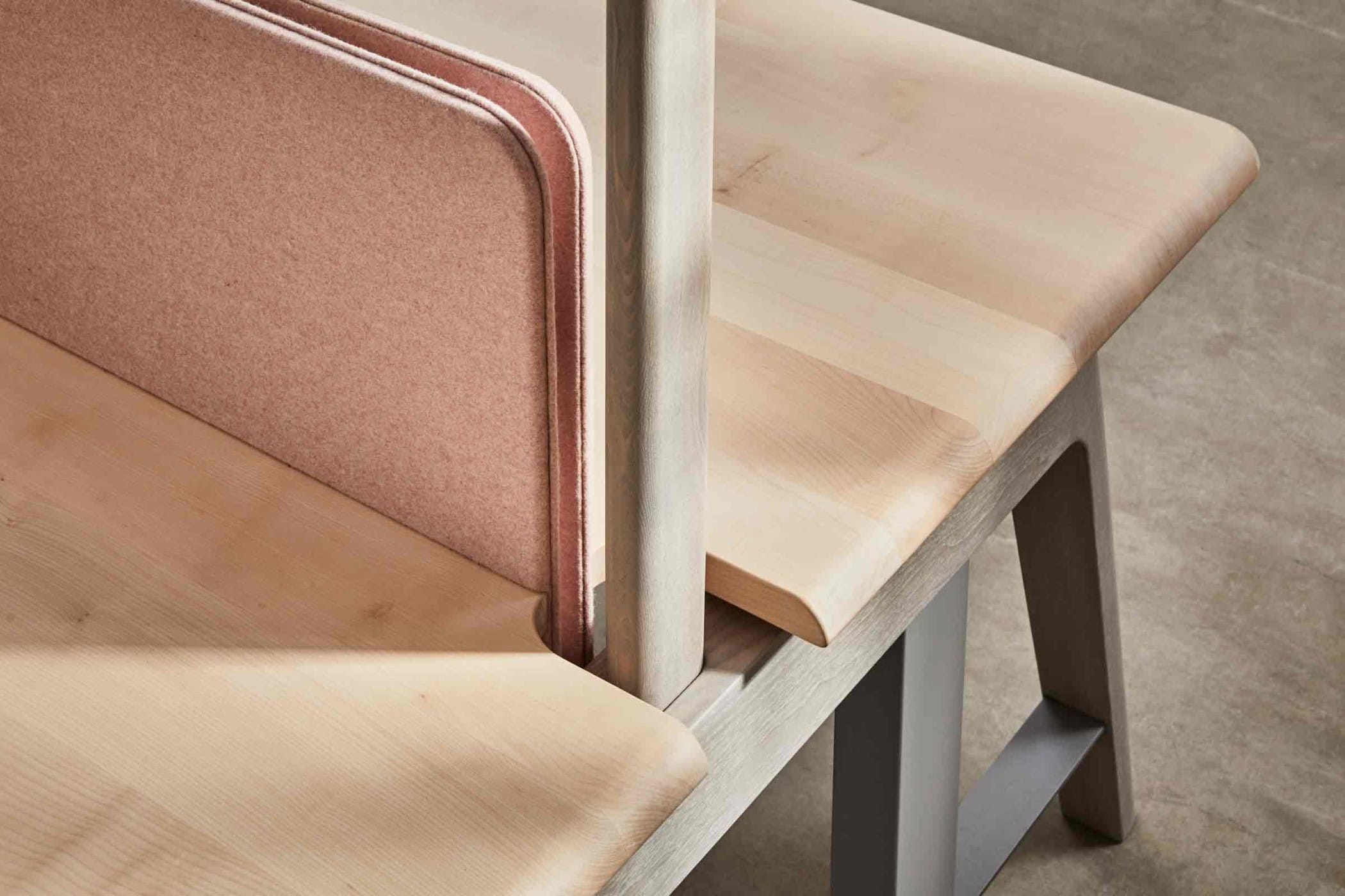sit-stand workbench made from sycamore and ash with a light pink felt board